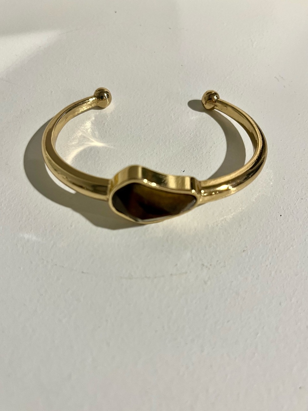 Gold-Tone Open Cuff Bracelet with Brown Stone Accent